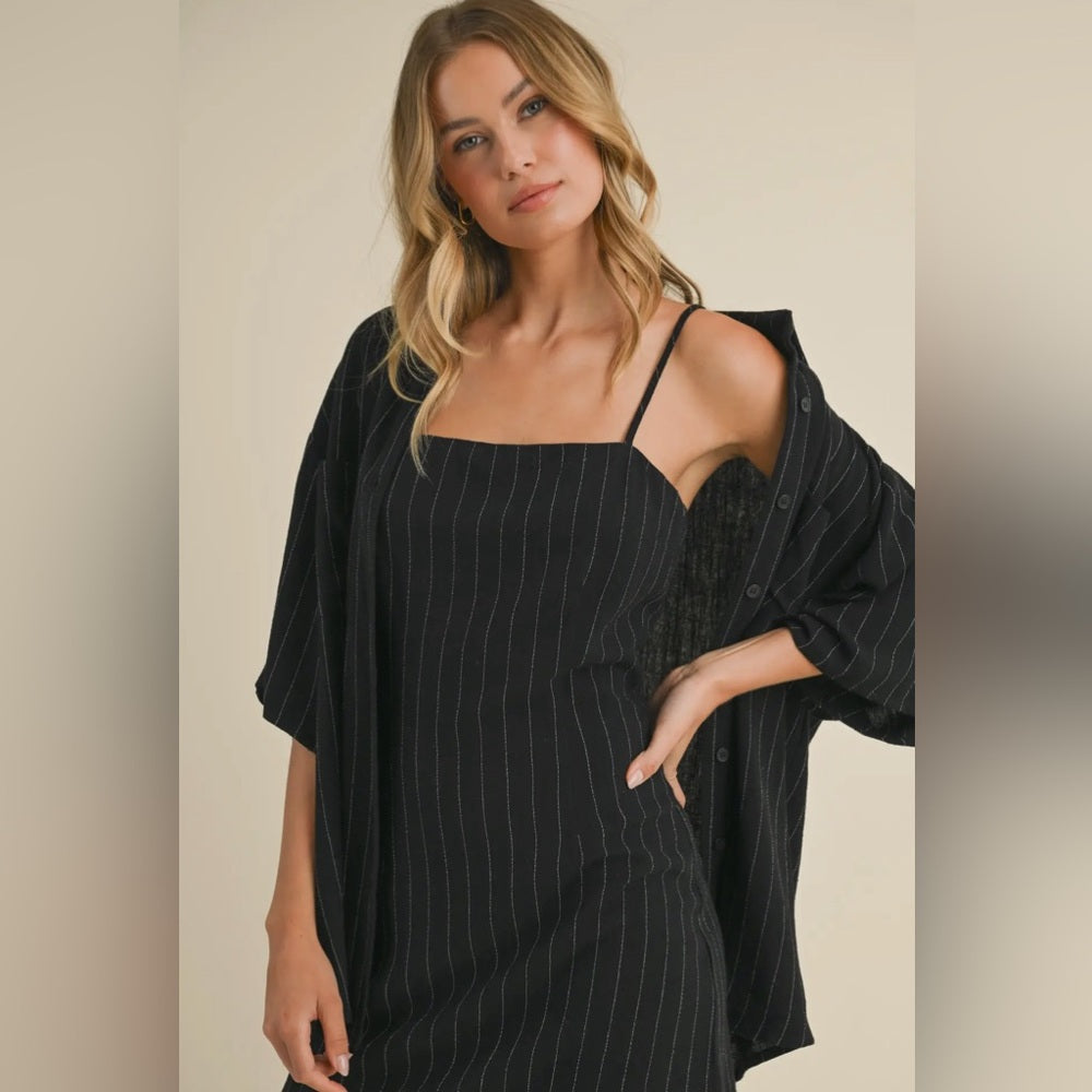 025. Pinstripe mini dress with oversized, button-down, collared shirt