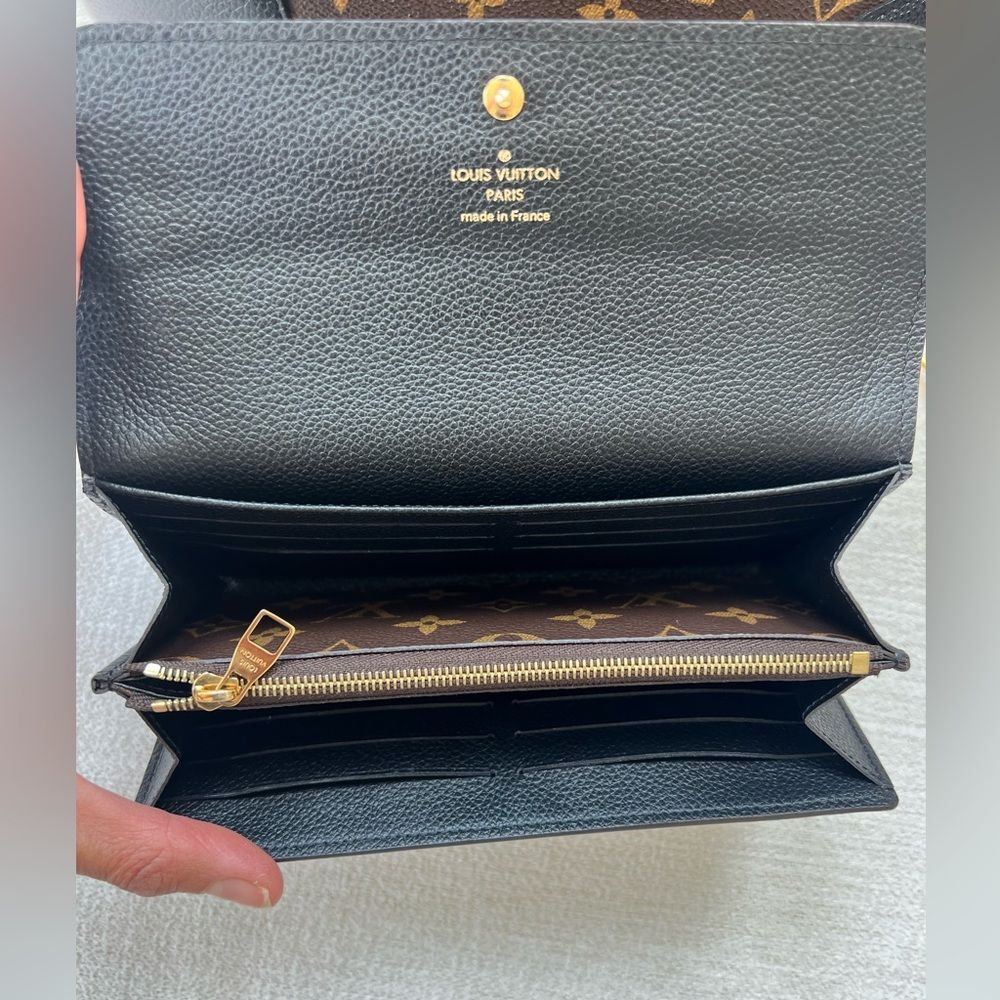 876. Louis Vuitton Black and Brown Monogram Wallet