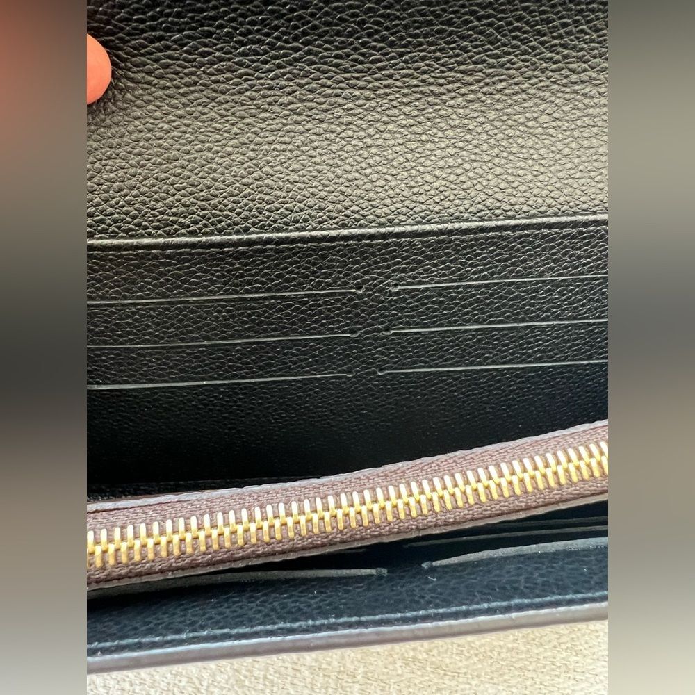 876. Louis Vuitton Black and Brown Monogram Wallet