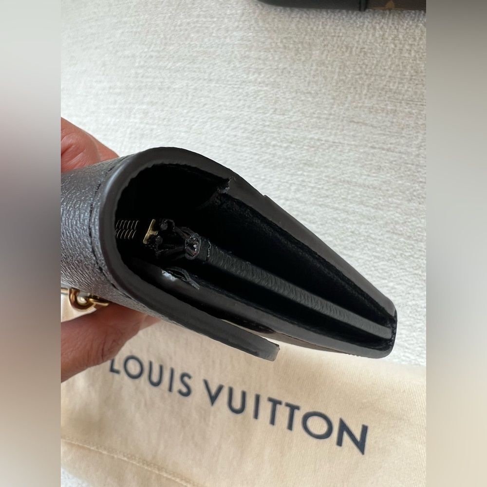 876. Louis Vuitton Black and Brown Monogram Wallet