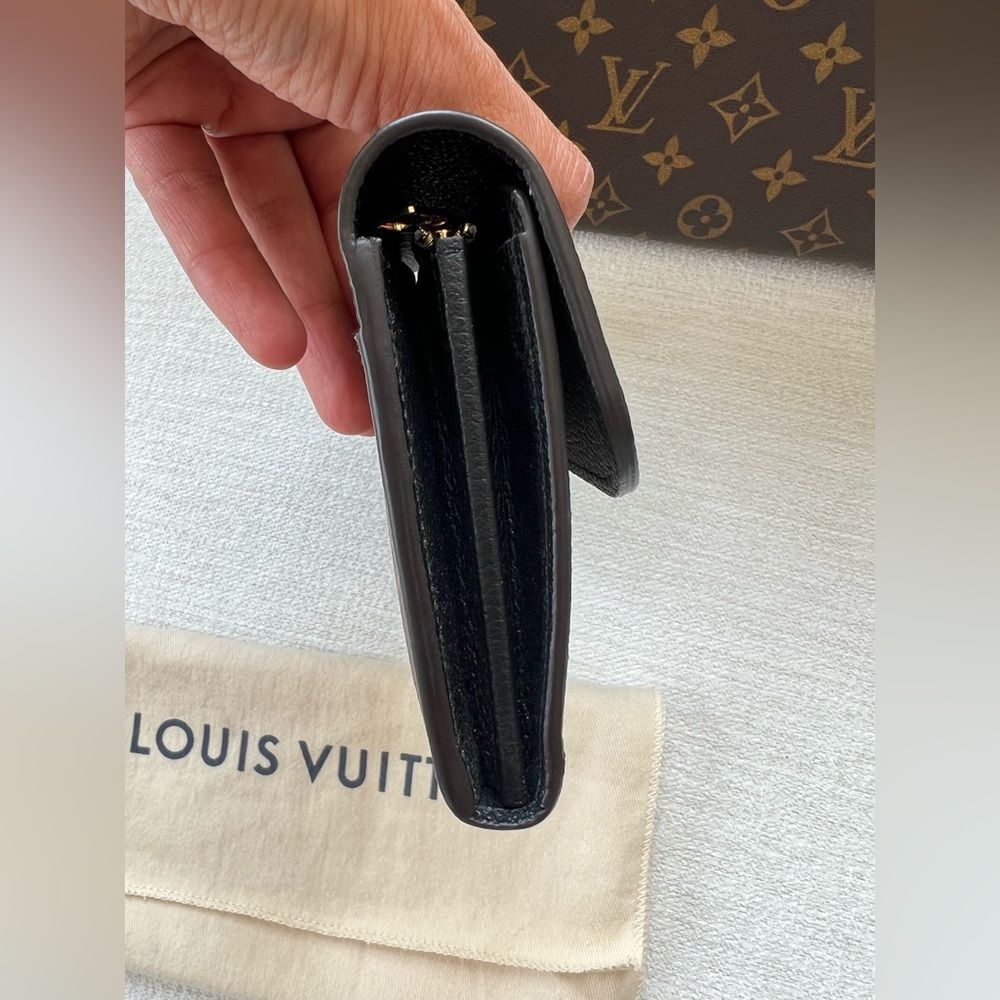 876. Louis Vuitton Black and Brown Monogram Wallet