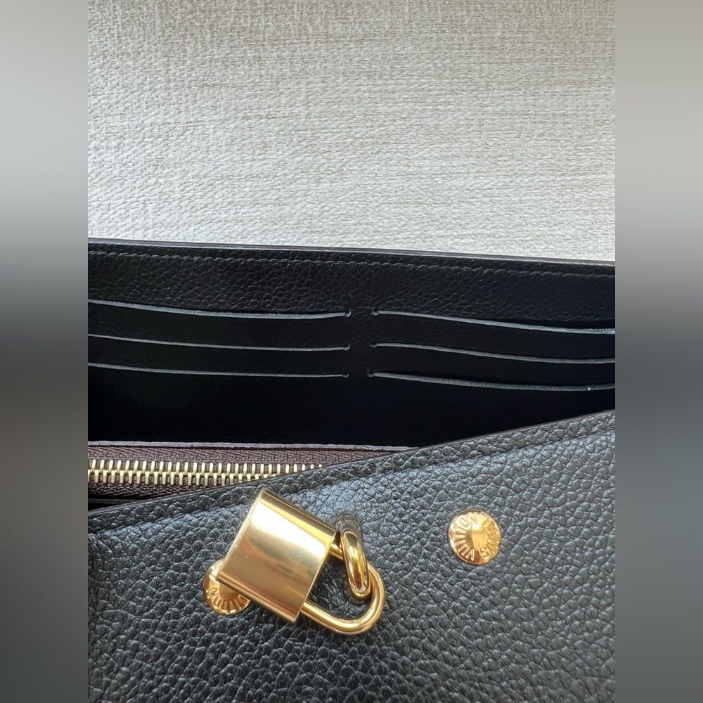 876. Louis Vuitton Black and Brown Monogram Wallet