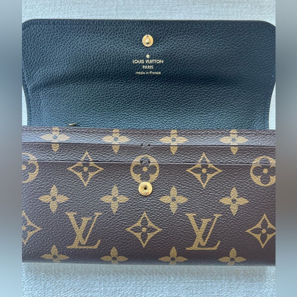 876. Louis Vuitton Black and Brown Monogram Wallet