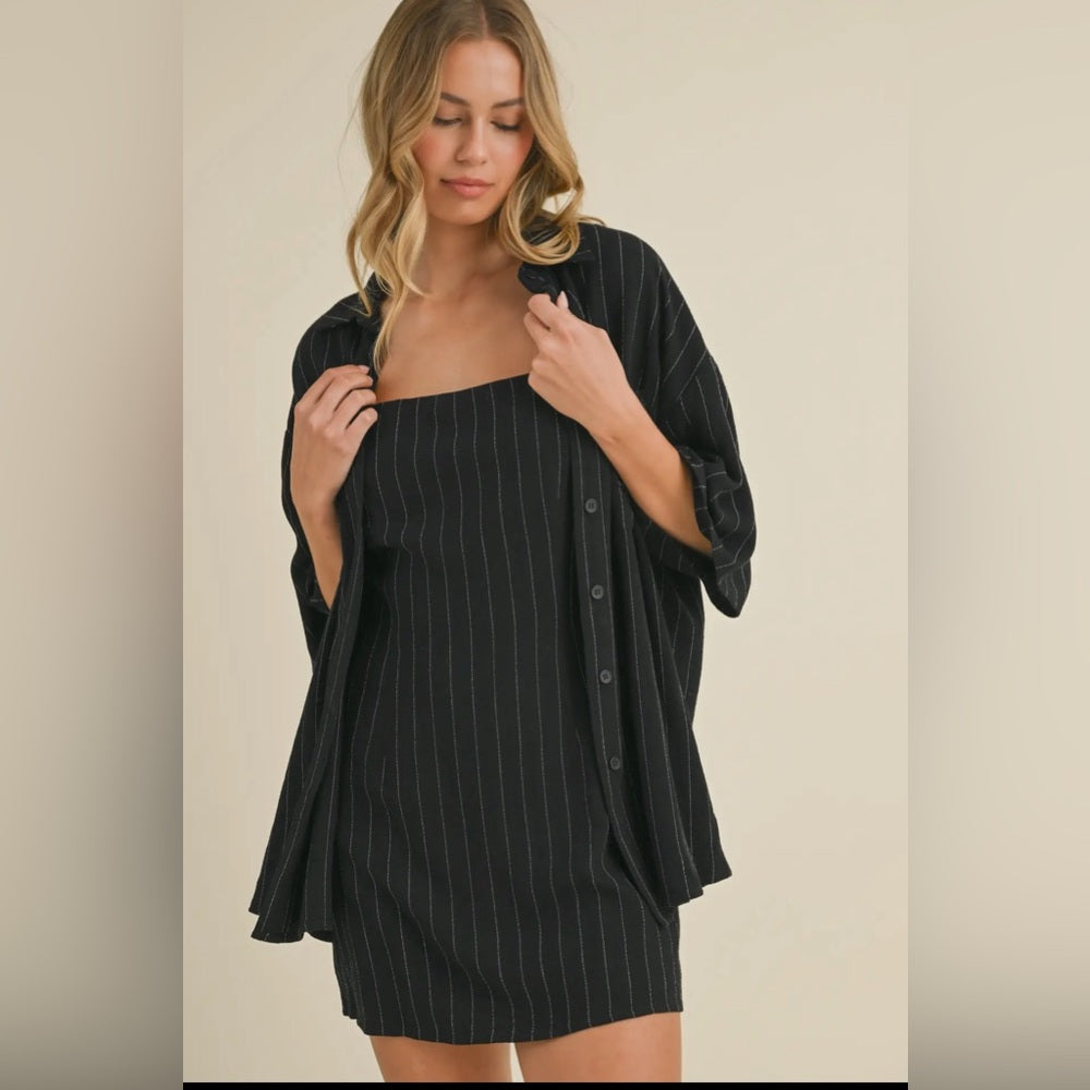 025. Pinstripe mini dress with oversized, button-down, collared shirt