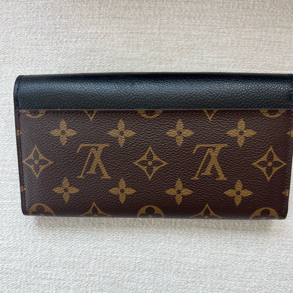 876. Louis Vuitton Black and Brown Monogram Wallet