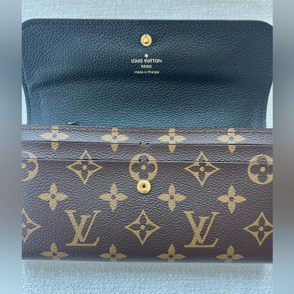 876. Louis Vuitton Black and Brown Monogram Wallet