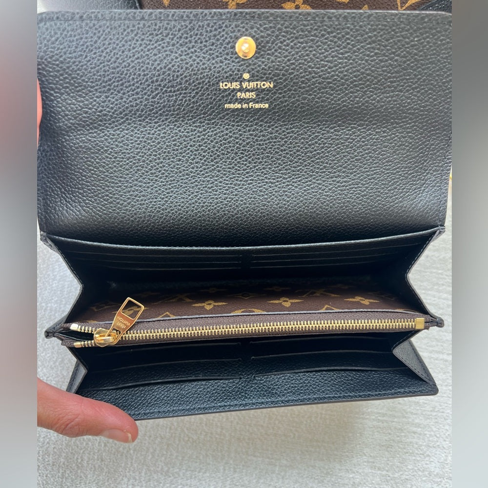 876. Louis Vuitton Black and Brown Monogram Wallet
