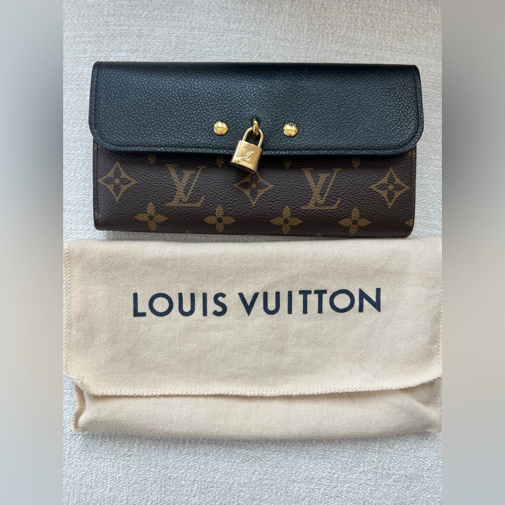 876. Louis Vuitton Black and Brown Monogram Wallet