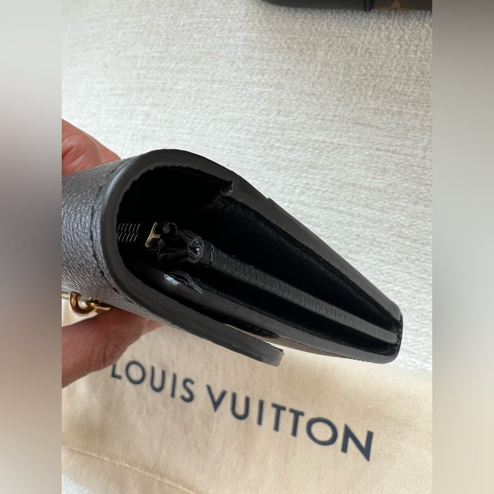876. Louis Vuitton Black and Brown Monogram Wallet