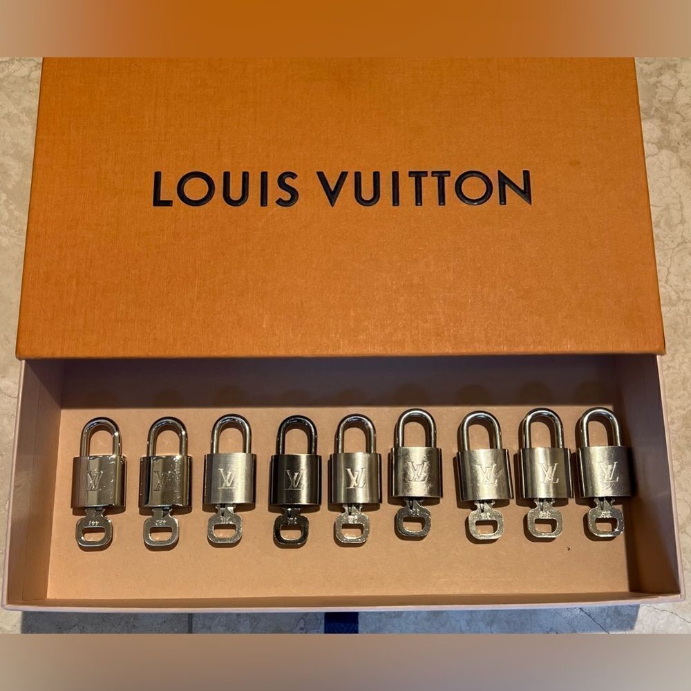 **SUPER RARE** SILVER LOUIS VUITTON LOCK AND KEY